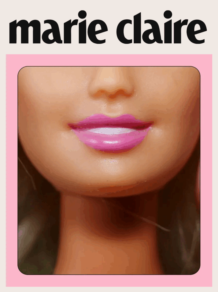 Close-up of a dolls face focusing on pink lips, framed by a pink border, with the words marie claire in bold black letters at the top.